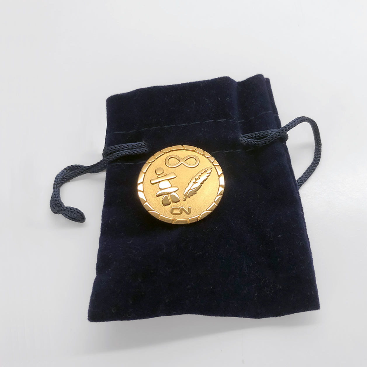 Photo of a gold plated lapel pin